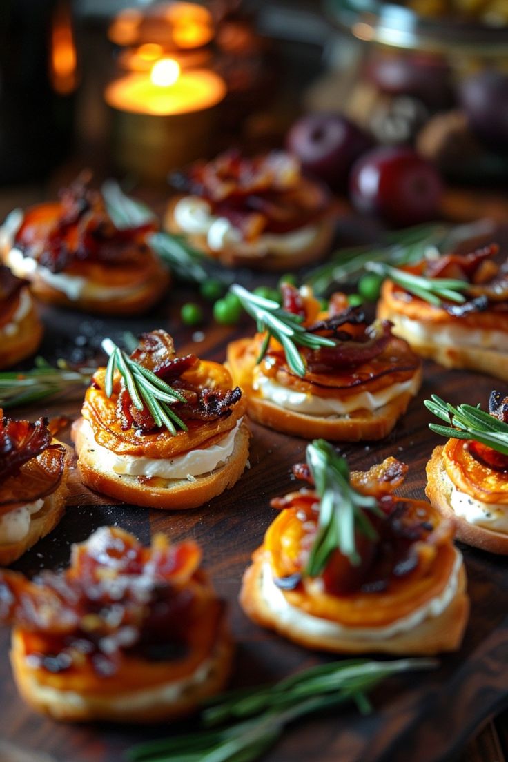 small appetizers with bacon, cheese and herbs sit on a wooden platter