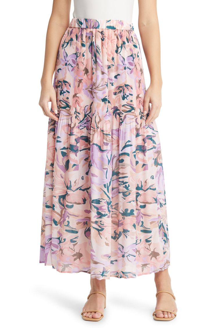 Delicate pleats soften to a flounce hem on an ankle-grazing maxi skirt covered in a mesmerizing floral print for contemporary charm. Elastic waist 97% polyester, 3% spandex Hand wash, dry flat Imported Pink Floral Print Maxi Bottoms, Flowy Feminine Maxi Skirt With Floral Print, Feminine Flowy Maxi Skirt With Floral Print, Daywear Floral Print Flowy Skirt, Floral Print Full Maxi Skirt With Voluminous Fit, Floral Print Full Maxi Skirt, Floral Print Maxi Skirt For Daywear, Floral Print Flowy Skirt For Daywear, Voluminous Floral Print Full Maxi Skirt