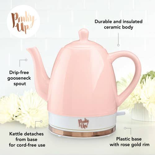 a pink tea kettle with instructions on how to use it and what to put in it