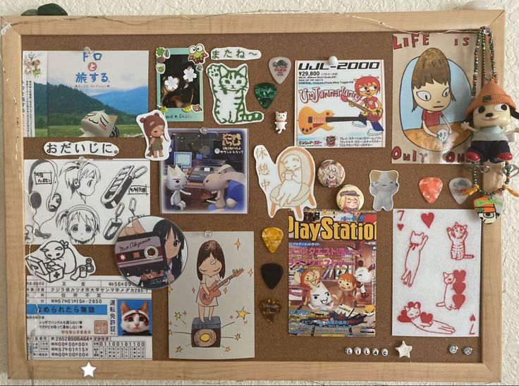 a bulletin board covered in stickers and magnets with pictures on it's side