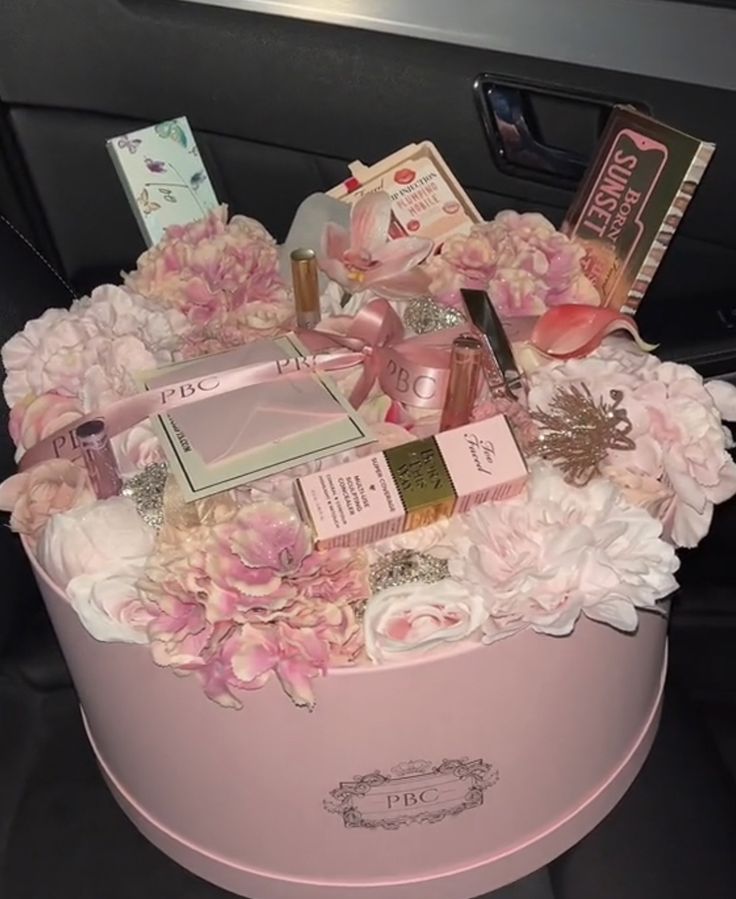 a pink box filled with lots of different items