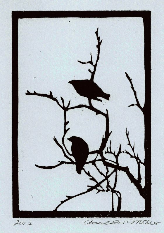 two birds sitting on top of a tree branch in front of a square shaped window