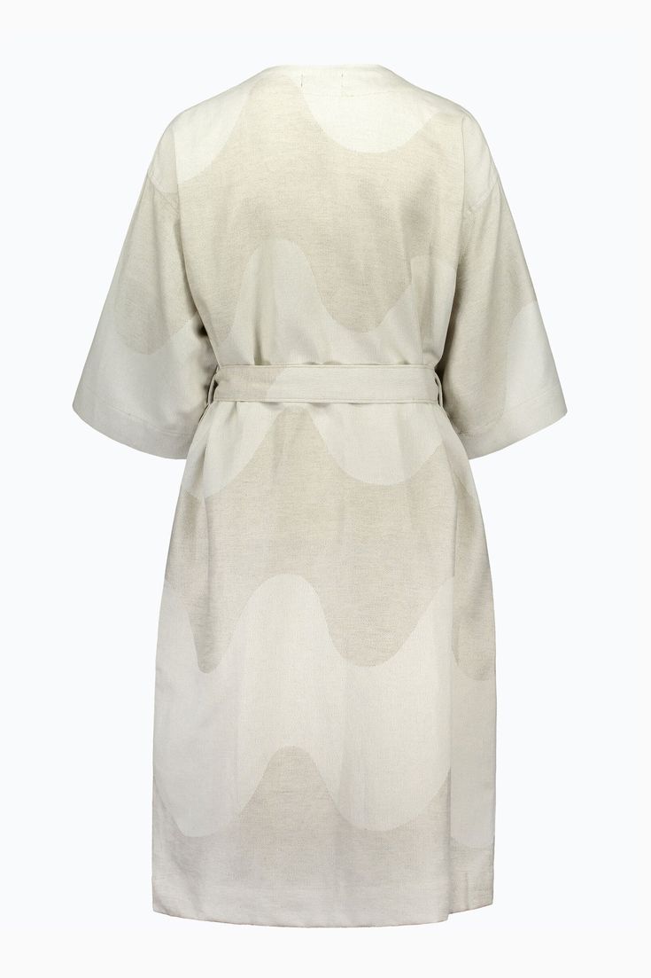 Collection: Summer 2021. Material: 60% Linen/40% Cotton. Description: Made from a soft cotton and linen blend, this morning gown features the Lokki pattern and a jacquard knit. The kimono-style gown has side seam pockets and a detachable belt. The idea for the Lokki (seagull) pattern came to Maija Isola when she was looking at a window with a curtain drawn across it. The sun was shining, and the wide folds of the curtain formed wavy shadows on the fabric. Maija had a sudden inspiration: if a fab Elegant Spring Cotton Kimono, Elegant Spring Cotton Robe, Cream Summer Daywear Robe, Spring Beige Linen Robe, Beige Linen Spring Robe, Beige Linen Robe For Spring, Linen Kimono For Daywear, Neutral Cotton Dress For Daywear, Cream Kimono For Daywear In Spring