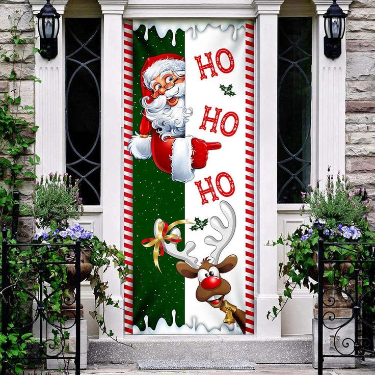 a christmas door cover with santa clause and reindeers