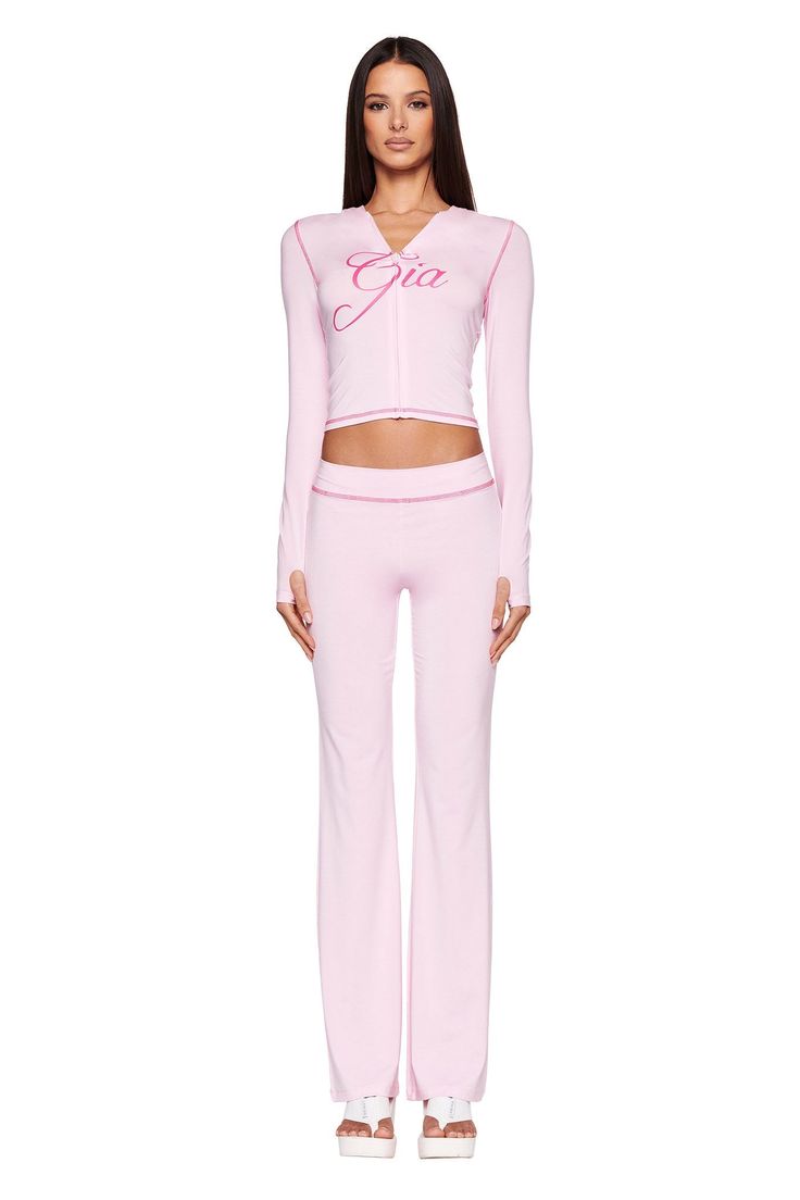 Details Best-selling Blare Trackpant in a new pastel pink colourway Stretchy bamboo and jersey fabrication Low-rise waist and bodycon silhouette Wide, elastic waistband for a comfortable, stretchy fit Featuring placement print 'I.AM.GIA' logo on the bum in contrast pink Contrast pink stitching detail around the waistband Pull-on construction to slip into with ease Unlined - This fabric is not sheer Recommended Underwear: Due to the low-mid rise, we recommend wearing this garment with a seamless, Pilates Fashion, Fame Clothes, Princess Couture, Pink Contrast, Placement Print, Causal Outfits, I Am Gia, Pink Pastel, Festival Dress