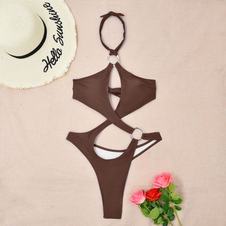 Indulge in allure with our Sultry Solid Hollow Out Monokini. This tantalizing one-piece swimsuit features intricate cut-out detailing that accentuates your curves in all the right places. Crafted from high-quality materials, it offers a perfect balance of comfort and sensuality, making it an ideal choice for poolside lounging or beach escapades. Embrace elegance and confidence as you make a splash in this statement-making swimsuitPattern: Solid colorWith Steel Bracket: With chest pad without ste Beachwear Bodysuit With Halter Neck And Cutout, Beachwear Bodysuit With Cutout Halter Neck, Cutout Halter Neck Bodysuit For Beachwear, Cutout Halter Neck Bodysuit For Swimming, Cutout Halter Neck Bodysuit For Pool, Halter Neck Cutout Bodysuit For Pool, Backless Cutout Swimwear For The Pool, Vacation Bodysuit With Cutout And Backless Design, Beachwear Hollow Out Swimwear For Poolside