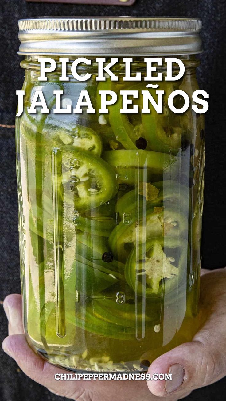 Holding a jar of the homemade Pickled Jalapeños. Pickled Jalapeno Recipe, Pickled Jalapeno Peppers, Pickled Jalapenos, Pickled Jalapeño, Jalapeno Recipes, Pickling Spice, Burger Toppings, Easy Bbq, Pickling Jalapenos