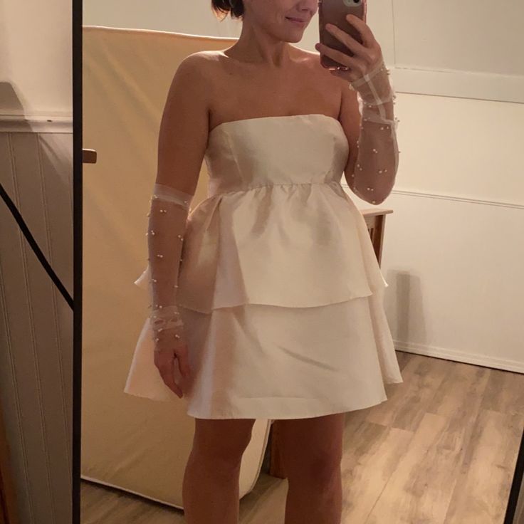 Bought For Wedding But Wore A Different Dress. Ivory In Color And Size Large. I’m An 8 For Reference. Strapless Cream Party Dress, Champagne Mini Dress For Wedding, Strapless Feminine Mini Dress For Wedding, Cream Strapless Prom Dress, Mini Strapless Dress With Ruffles For Wedding, Cream Mini Dress For Wedding, Summer Strapless Bridesmaid Dress For Wedding, Strapless Summer Bridesmaid Dress, Strapless Bridesmaid Dress For Summer Wedding