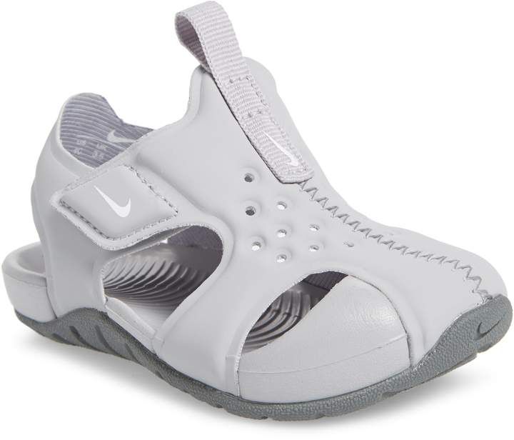 Nike Sunray Protect 2 Sandal Non-slip Sport Sandals For Outdoor Activities, Lightweight White Sport Sandals For Outdoor, Synthetic Round Toe Sport Sandals For Water Sports, Sporty Closed Toe Slip-resistant Sandals, White Slip-resistant Sandals For Outdoor, White Slip-resistant Outdoor Sandals, Spring Outdoor Slip-resistant Sandals, Gray Non-slip Round Toe Sport Sandals, Sporty Non-slip Adjustable Sandals