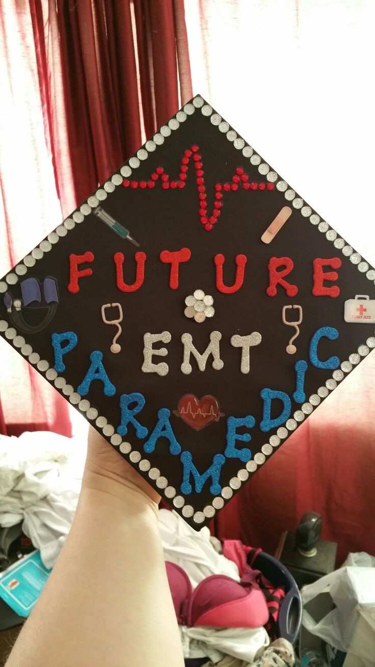 a hand holding up a graduation cap that says future pemtic paramed