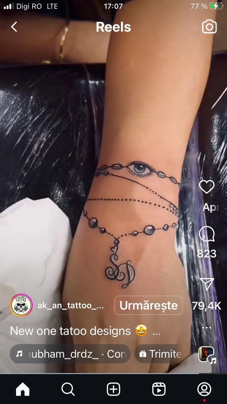 a woman's arm with tattoos on it and the caption reads, new one tattoo designs