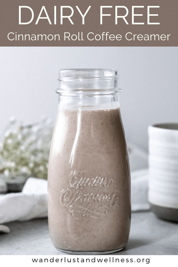 dairy free cinnamon roll coffee creamer in a glass jar with text overlay that reads, dairy free cinnamon roll coffee creamer