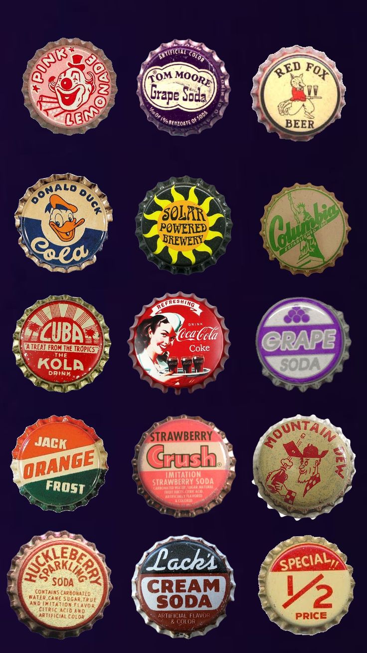 many different types of beer bottle caps on display