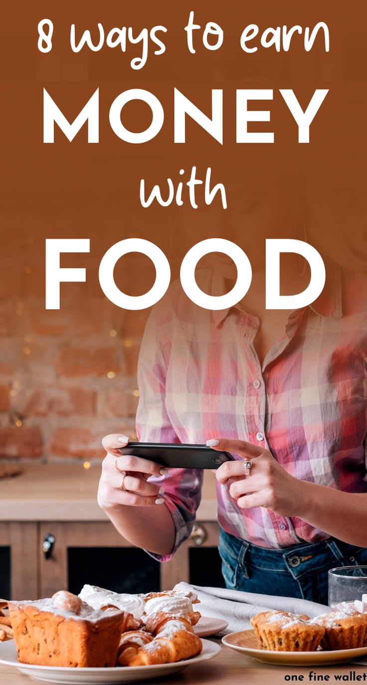 a woman holding a remote control in front of food