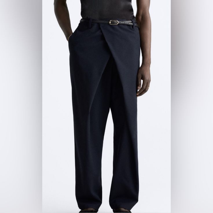 Zara Limited Edition. Relaxed Fit Pants. Front Pockets And Back Double Welt Pockets. Front Wrap Closure With Zipper, Hidden Metal Hook, And Buttons. Outer Shell 69% Polyester 30% Viscose 1% Elastane New With Tags. Navy Color. Difference In Color Due To Camera Flash. Men’s Sizing Us 30. Sold Out On Line. Wrap Pants Men, Zara Business Casual Pants With Belt Loops, Modern High Waist Blue Pants, Modern Blue High-waist Pants, Office Blue Pants With Belt Loops, Modern Blue Bottoms For Business Casual, Modern Business Casual Blue Bottoms, Modern Blue Business Casual Bottoms, Modern Blue Pants With Belt Loops