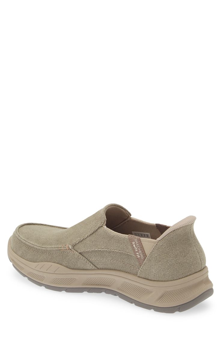 With a padded collar and stretchy insets, this slip-on sneaker keeps you effortlessly comfortable all day on a cushioned footbed. Textile upper/synthetic lining and sole Imported Synthetic Slip-on Sneakers With Arch Support, Casual Ergonomic Slip-on Sneakers With Arch Support, Walking Slip-on Sneakers With Arch Support, Slip-on Sneakers For Walking With Arch Support, Slip-on Sneakers With Arch Support For Walking, Casual Ergonomic Slip-ons With Arch Support, Comfortable Slip-ons For Light Sports With Arch Support, Comfortable Slip-ons With Arch Support For Light Sports, Comfortable Cushioned Slip-on Sneakers