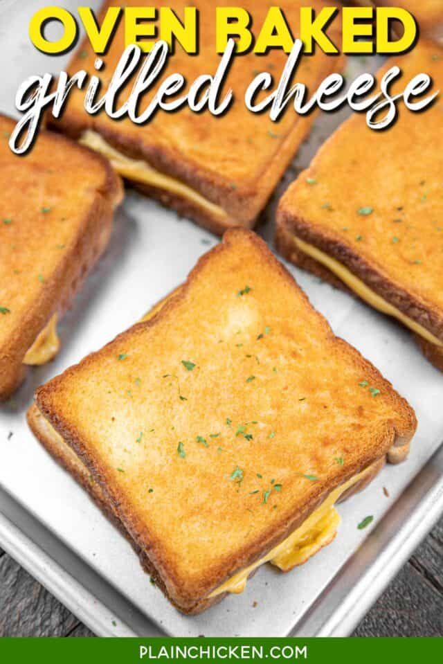 four grilled cheese sandwiches on a pan with the words oven baked grilled cheese