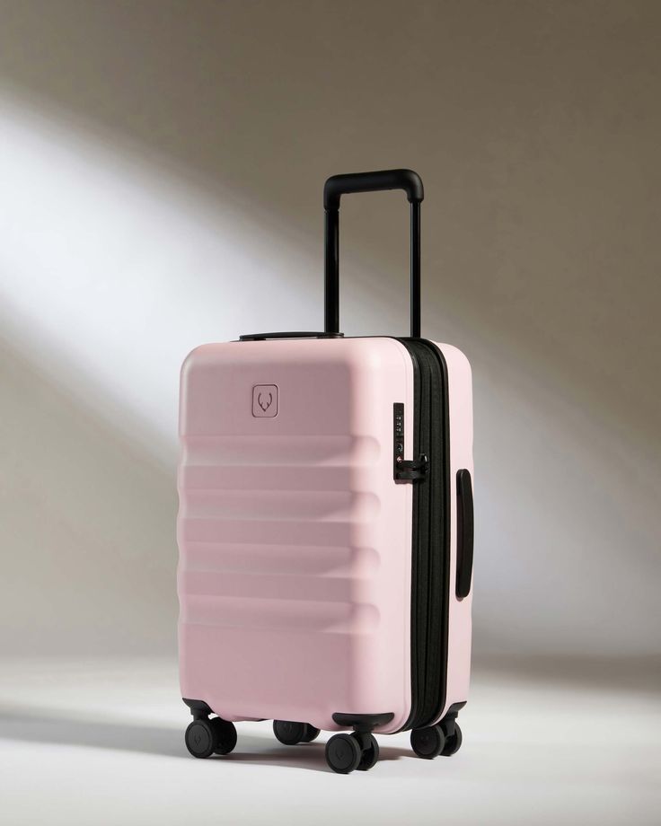 They say good things come in threes, and our Icon Stripe Set is no exception. Combining three sizes in one complete set, including one carry-on case with expandable design, unlock endless packing possibilities for extended stays or family trips. Icon Stripe is crafted from the highest quality, using recycled polycarbonate. The hardwearing shell ensures your belongings are well-protected when stowed in the car boot or placed in the luggage rack. Plus, the different size cases are cleverly designe Modern Pink Luggage With Sleeve, Modern Pink Rectangular Luggage, Pink Luggage Sets, Recycle Interior, Underseat Carry On, Pink Suitcase, Pink Luggage, Hard Suitcase, Luxury Luggage