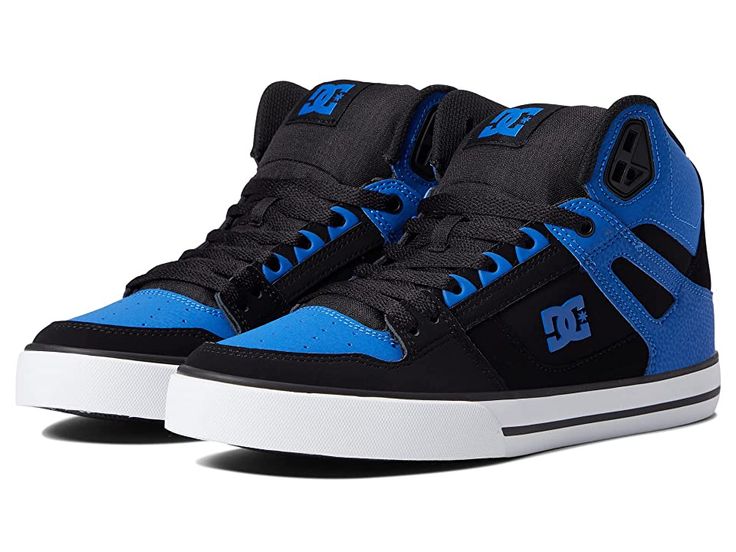 DC Pure High-Top WC - Men's Skate Shoes : Black/Royal : Bring clean, classic skate style to your everyday with the DC Pure High-Top WC skateboard shoes! Skate shoes in a high-top silhouette. Leather, nubuck, suede, or canvas upper with premium textile quarter. Foam padded tongue and collar for added comfort and support. Mesh lining for breathable wear. Wrap cupsole construction for long-lasting durability. Abrasion-resistant sticky rubber outsole. Outsole features DC's trademarked Pill pattern t Blue Urban High-top Sneakers For Skateboarding, Mid-top Suede Skate Shoes With Boost Midsole, High-top Suede Skate Shoes With Branded Insole, Canvas High-top Sneakers With Contrast Sole For Skateboarding, Sporty Suede Mid-top Skate Shoes, High-top Sneakers For Skateboarding, Sporty High-top Sneakers For Skateboarding, Suede High-top Sneakers With Vulcanized Sole For Streetwear, Urban Canvas Skate Shoes With Cushioned Midsole