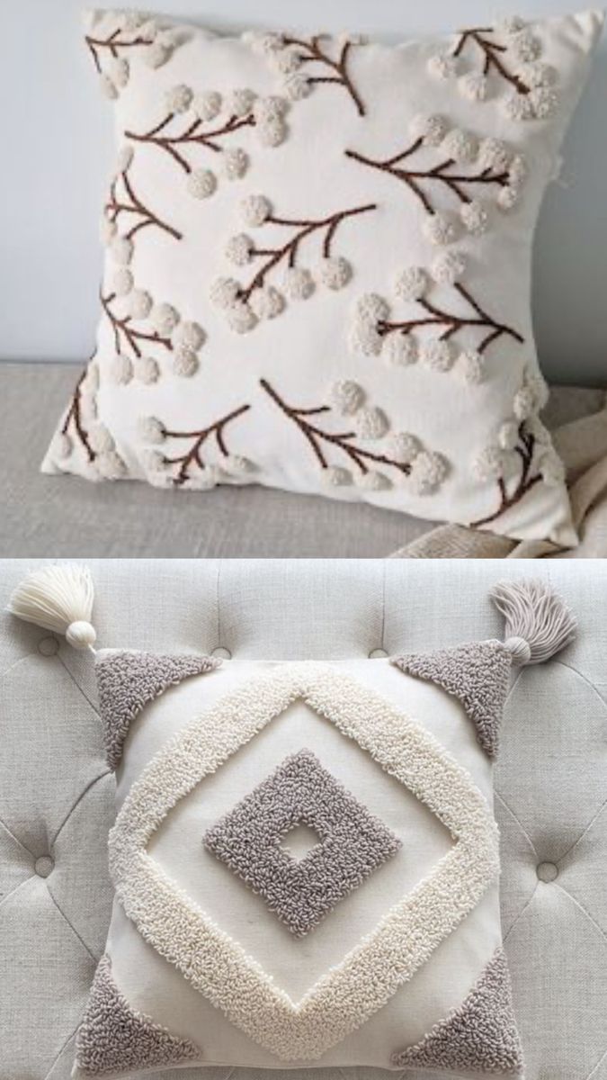 two pillows that are sitting on top of a couch and one has a decorative pillow