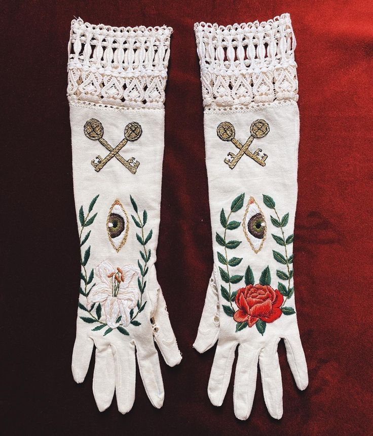 handmade and embroidered gloves inspired by the hierophant tarot card. by tessa perlow #heirophant #tarot #gloves #embroidery #keys #eye #embroideredrose #lily #tessaperlow Gloves Embroidery, The Hierophant Tarot Card, Hierophant Tarot Card, The Hierophant Tarot, Hierophant Tarot, Tessa Perlow, Embroidered Gloves, Fancy Gloves, The Hierophant