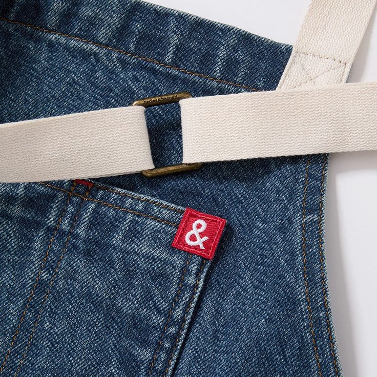 For Hedley & Bennett, it all started with denim. And now, we’ve returned to our roots with our most durable, iconic denim yet. Meet our 13 oz, 100% cotton Essential Georgia Blue Denim Apron: Indigo denim broken down to a medium blue tone using vintage washing and aging techniques for a beautiful, lasting material that fits like your favorite pair of jeans. White adjustable straps and a towel loop, plus a red logo and top stitch channel the carefree vibes of classic Americana. Michelin Star Chef, Denim Apron, Classic Americana, Blue Tone, Indigo Denim, Michelin Star, Red Logo, Jeans White, Blue Tones