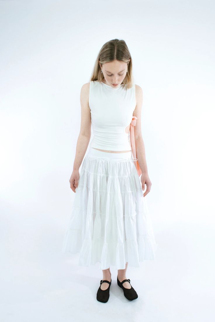 HETTI SKIRT IN WHITE – SANDY LIANG White Fitted Daywear Skirt, White Fitted Skirt For Daywear, White Ruffled Skirt For Spring, White Feminine Tiered Maxi Skirt, Fitted White Ruffled Skirt, White Ruffled Full Skirt, White Long Feminine Skirt, White Tiered Maxi Skirt For Daywear, White Tiered Skirt With Gathered Details