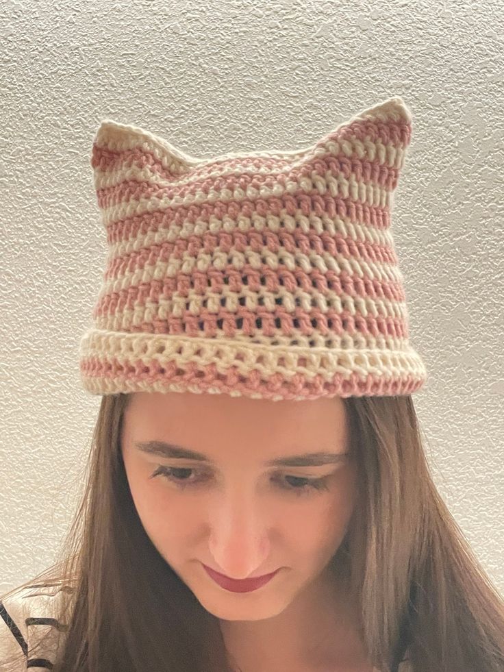 "Handmade crocheted cat ear hat. Very Soft and comfortable! Available in multiple colors and stripe patterns. Made to order. For a striped hat choose a primary and secondary color. For a solid colored hat choose a primary color and the option \"none\" in the secondary color box. Thanks for checking out our store. We also have a number of other crocheted creations available as well! Made Of High Quality Acrylic Yarn If you have a different color or pattern you would like please message us and we Cheap Cat Ear Hat With Cat Design, Cheap Cat Ears Hat With Cat Design, Cat Hat With Ear Holes, Cat Ears Hat Crochet Pattern, Cat Ear Hat, Crochet Cat Hat, Ear Hat, Cat Ears Hat, Cat Eared Beanie