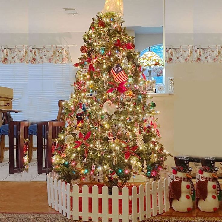 a decorated christmas tree in a living room