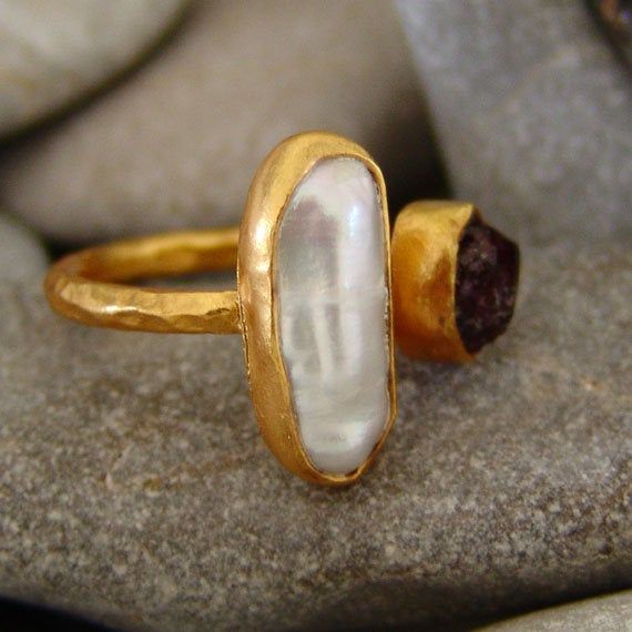 METAL: 925k Silver GEM:Natural Ruby And pearl (lab created) COATING: 24k gold over (We can made a special type of coating for your personal preference ) MATERIEL : 925K Sterling Silver ( Some of my items vermeil gold over silver for looks rich . But i can finish in silver too ) Features of Pearl Stone * The origin of the cultured pearls, which is obtained by putting a piece of mother-of-pearl on the oysters for 4-5 years, is expected to cover it with its own target. * Pearls give birth in time. Handmade Gold Oval Pearl Ring, Gold Hallmarked Pearl Ring For Gift, Unique Gold Oval Pearl Ring, Handmade Gold Pearl Ring For Anniversary, Ruby Silver Ring, Pink Stone Ring, Pink Stone Rings, Libra And Pisces, Ring Ruby