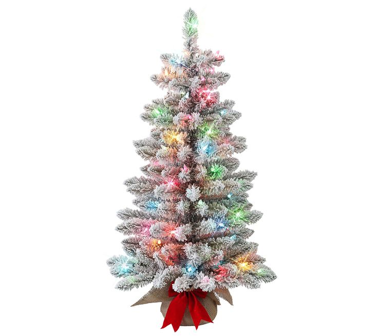 a white christmas tree with red ribbon and lights on it's top, in front of a white background