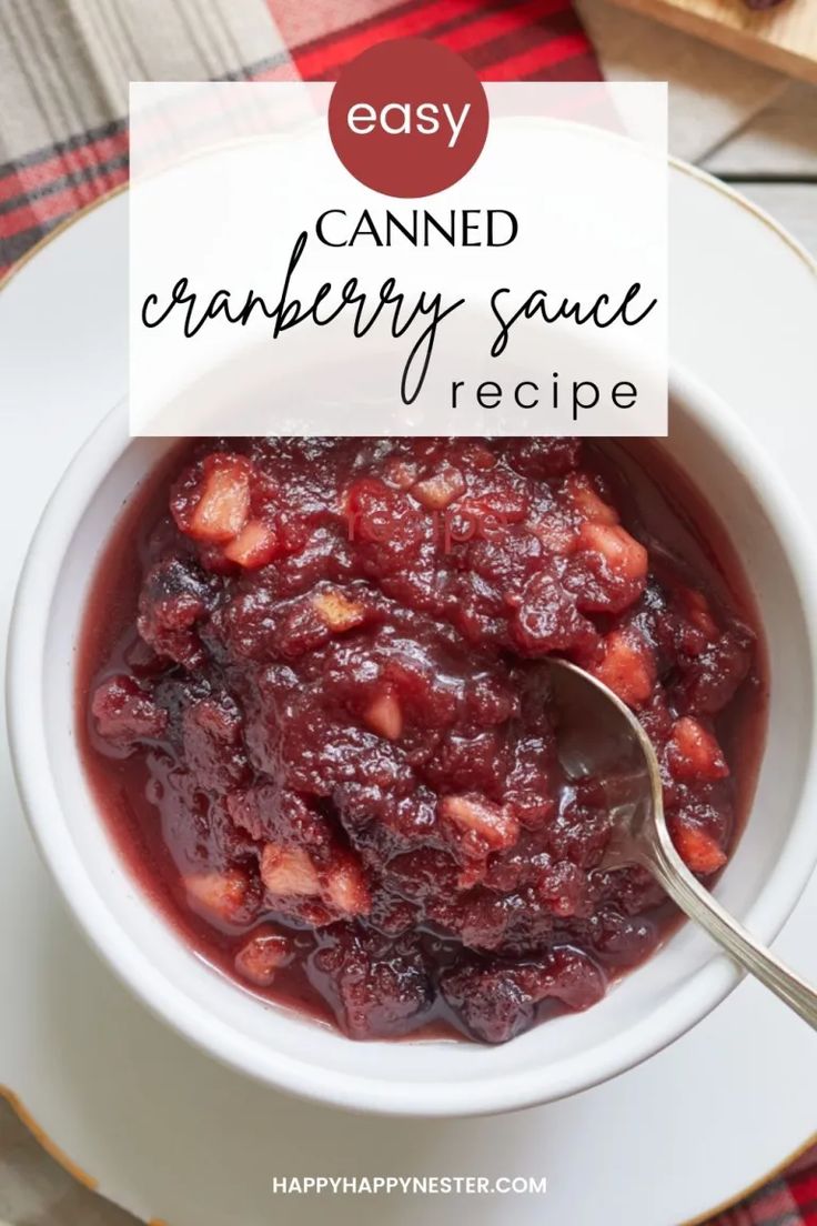 a bowl filled with cranberry sauce on top of a white plate