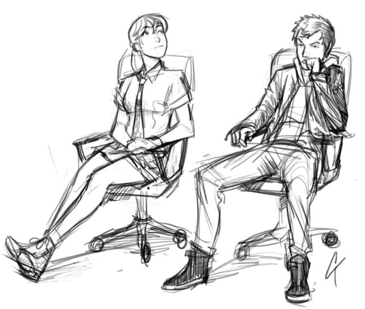 two people are sitting in chairs and one is talking on the phone