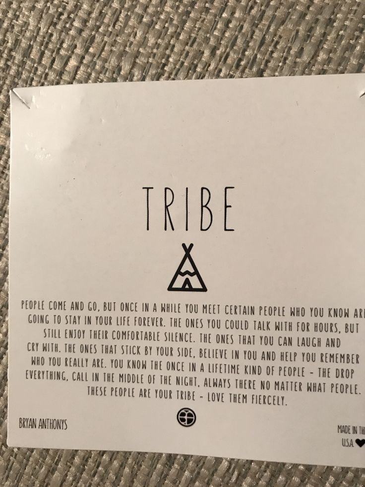 a piece of paper with the words tribe on it