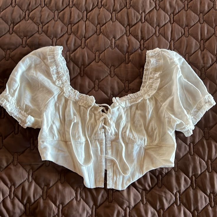 Nwt Womens Blouse By Pacsun Features Puff Sleeve And Tie Top. The Waist Is Detailed With A Corset Bustier Style. Summer Bohemian Cropped Peasant Top, 90s Clothes, Pacsun Tops, Corset Bustier, Spring Summer 2024, Tie Top, Cabinet Design, Blouse Top, Kitchen Cabinet