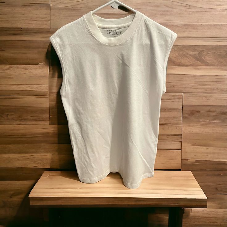 Brand New White Galaxy Sleeveless Shirt Sleeveless Cotton Tank Top, White Sleeveless Muscle Tee, White Sleeveless Cotton Muscle Tee, White Cotton Sleeveless Muscle Tee, White Sleeveless Basic Vest, White Sleeveless Muscle Tee For Everyday, Basic Sleeveless Muscle Tee For Summer, White Sleeveless Everyday Vest, White Sleeveless Vest For Everyday