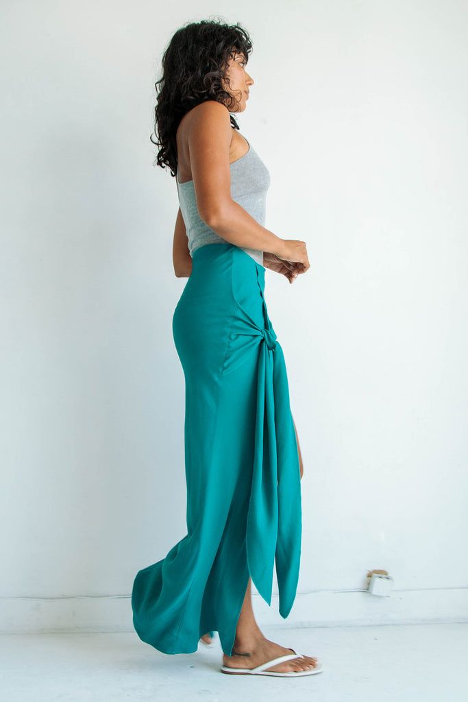 Summer Asymmetrical Maxi Skirt With Side Slits, Asymmetrical Tie Waist Flowy Skirt, Chic Wrap Flowy Skirt, Summer Asymmetrical Skirt With Tie Waist, Flowy Asymmetrical Skirt With Tie Waist, Asymmetrical Flowy Skirt With Tie Waist, Chic Rayon Beach Skirt, Chic Beach Rayon Skirt, Chic Draped Summer Bottoms