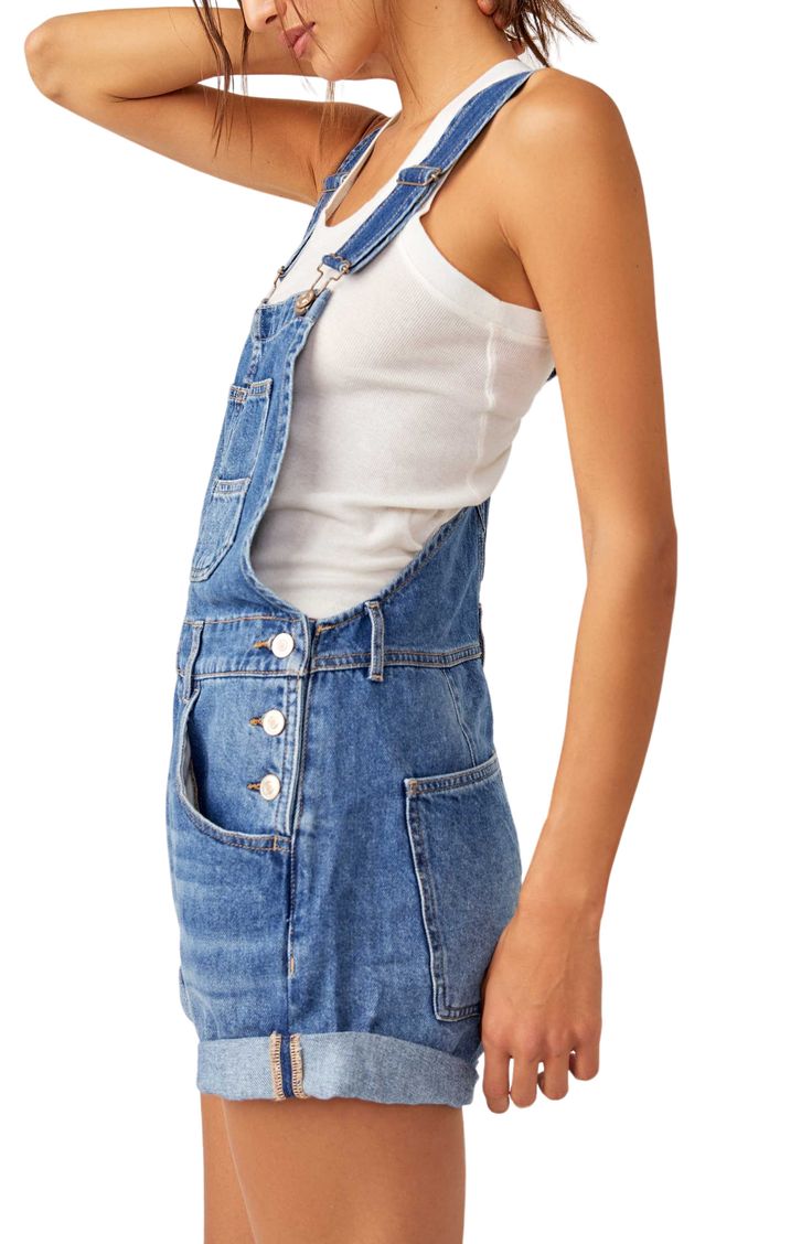 Make it a casual-cool day in these classic shortalls designed in nonstretch denim with easy cuffed hems. 25 1/2" center front length; 3" inseam; 27" leg opening (size Medium). 100% cotton Dry clean or machine wash, tumble dry Imported Spring Shortalls With Adjustable Straps And Relaxed Fit, Cotton Cutoff Shortalls With Pockets, Medium Wash Cotton Shortalls With Adjustable Straps, Trendy Bib Front Shortalls, Spring Cotton Shortalls With Frayed Hem, Cotton Shortalls With Frayed Hem For Spring, Spring Cutoff Shortalls With Pockets, Summer Overalls With Adjustable Straps In Medium Wash, Spring Shortalls In Dark Wash