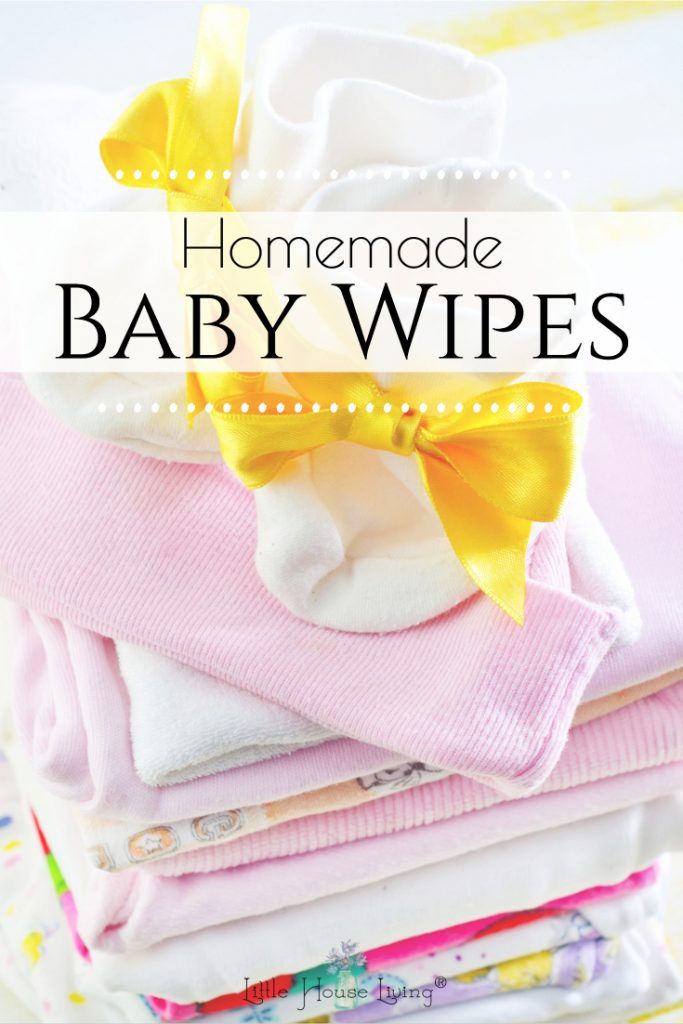 a stack of baby clothes with the title homemade baby wipes