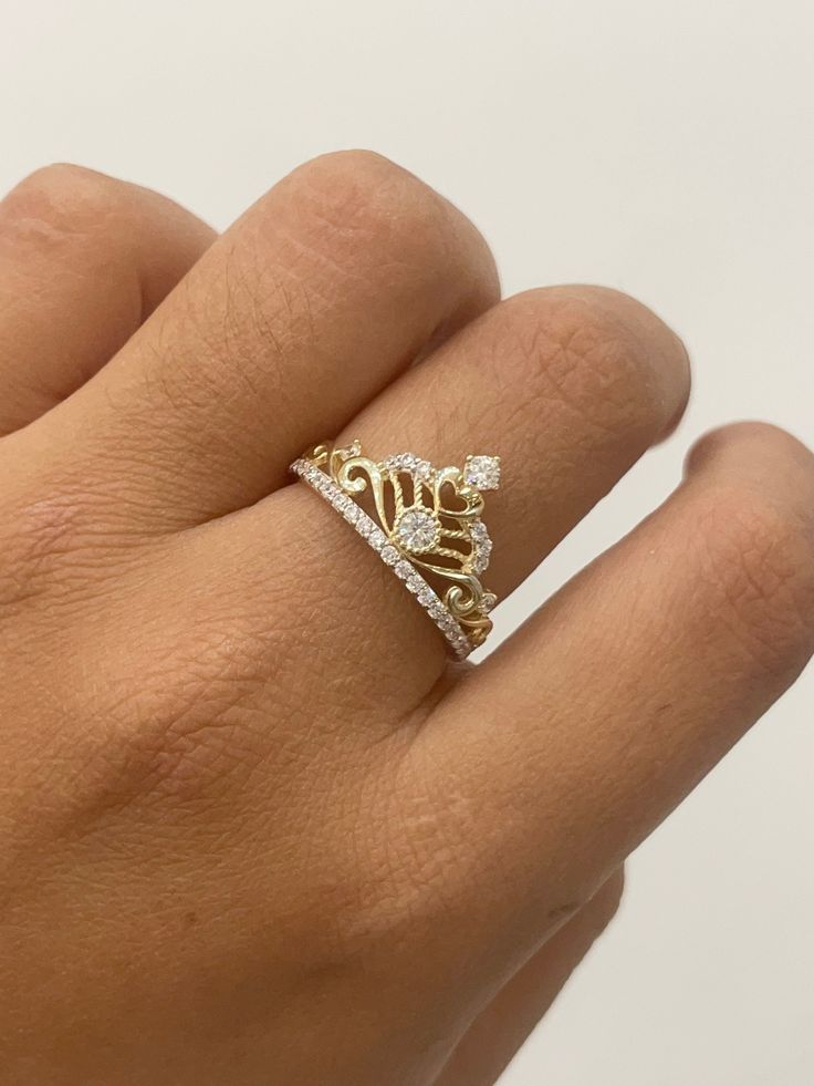 -100% 14k gold -24/7/365 wearable -size 7 -sizing upon request -will not tarnish, nor change color -let us know any questions -item sold buy piece. Weight is undetermined Classic Yellow Gold Rings With Crown Design, Gold Cubic Zirconia Crown Ring, 14k Gold Crown Design Fine Jewelry, Gold Crown Design Diamond Ring In 14k Gold, 14k Gold Crown Design Diamond Ring, Gold Diamond Ring With Crown Design In 14k, Luxury Yellow Gold Rings With Crown Design, Luxury Crown-shaped Jewelry With Prong Setting, Luxury Crown Design Rings For Anniversary