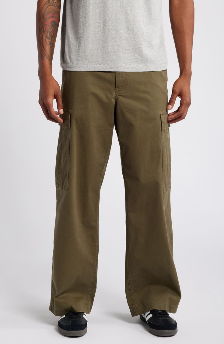 Roomy and versatile, these cargo pants made of soft cotton twill feature a baggy fit and a touch of stretch to keep you moving or relaxing in comfort. 31" inseam; 20" leg opening; 11 1/2" front rise; 15 1/2" back rise (size 32) Zip fly with button closure Front slant pockets; back flap pockets; cargo flap-patch pockets 97% cotton, 3% elastane Machine wash, tumble dry Imported Not available for sale and shipment to Germany Straight Leg Cotton Cargo Pants With Pockets, Cotton Cargo Pants With Tapered Leg And Cargo Pockets, Khaki Cotton Tapered Leg Cargo Jeans, Full-length Cotton Cargo Pants With Hip Pockets, Relaxed Fit Full-length Cotton Cargo Pants, Full Length Cotton Cargo Pants With Hip Pockets, Tapered Leg Khaki Cargo Jeans, Straight Leg Cotton Cargo Pants With Flap Pockets, Cotton Cargo Pants Full Length