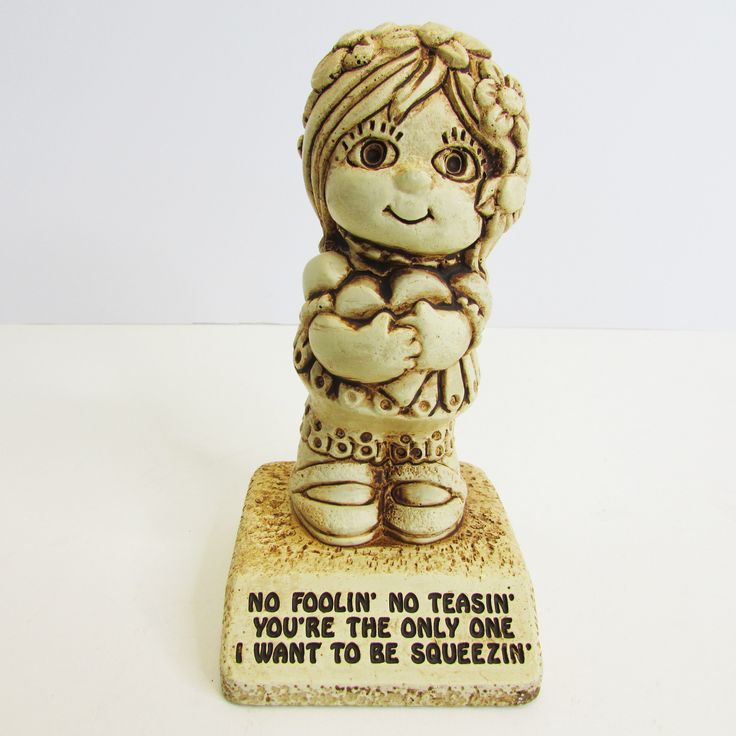 a ceramic figurine that says no foolin, no trashin you're the only one i want to be squezein