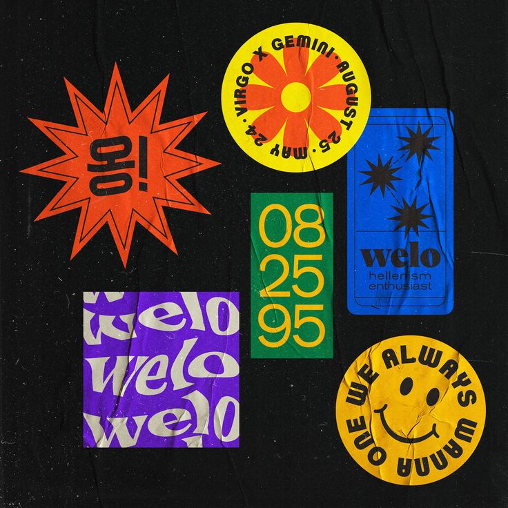 various stickers on a black surface with the words hello, welo, and smile