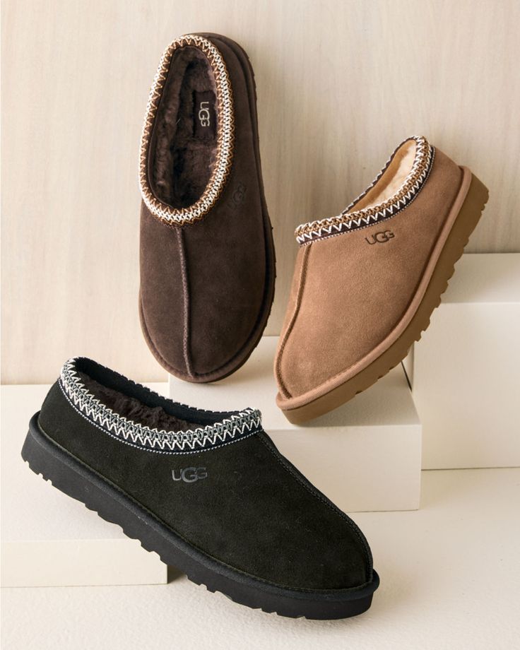 This is a slipper he'll want to wear everywhere - and he can, thanks to its up-for-anything design. In soft suede, with cool embroidered detailing, a plush wool footbed, and an outdoor-ready sole.  By UGG.  Round toe.  UGGplush™-wrapped foam footbed.  1 1/4" lightweight, ultradurable Treadlite by UGG™ man-made sole. Uggs Slippers Men, Uggs Men, Tasman Slippers, Ugg Tasman Slippers, Ugg Tasman, Suede Fashion, Ugg Slippers, Mens Uggs, Garnet Hill