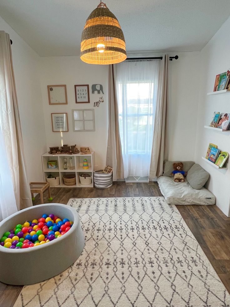 1 year old bedroom, with reading nook, ball pit and Montessori toys. Montessori Bedroom And Playroom, One Year Old Nursery, Playroom Ideas 1 Year, One Year Old Playroom Ideas, Montessori Bedroom One Year Old, Playroom With Ball Pit, Two Year Old Room Ideas, Minimalist Montessori Bedroom, Montessori Bedroom Infant