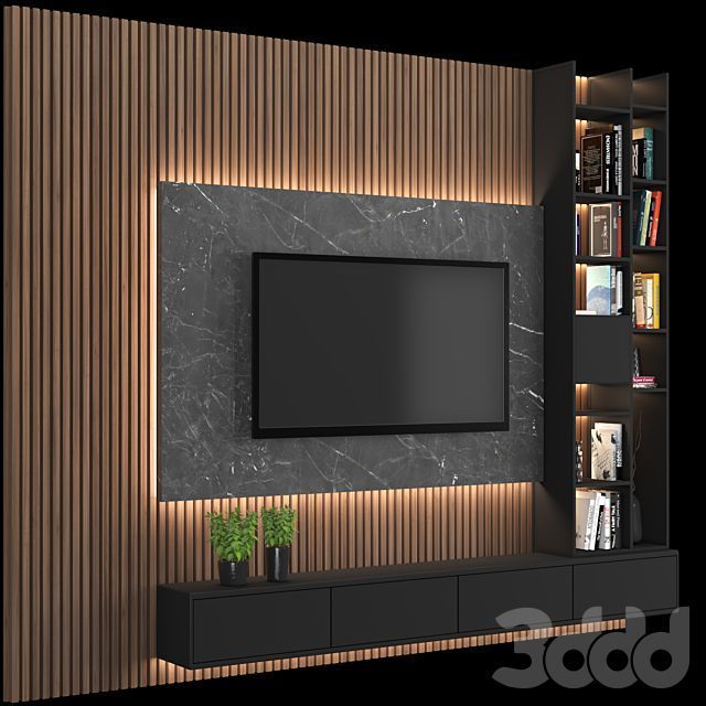 an entertainment center with a television mounted on the wall and bookshelves behind it