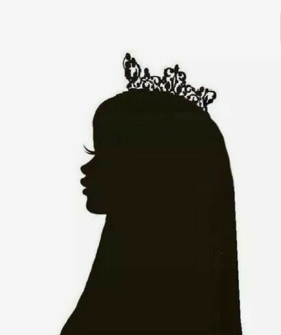 the silhouette of a woman wearing a tiara