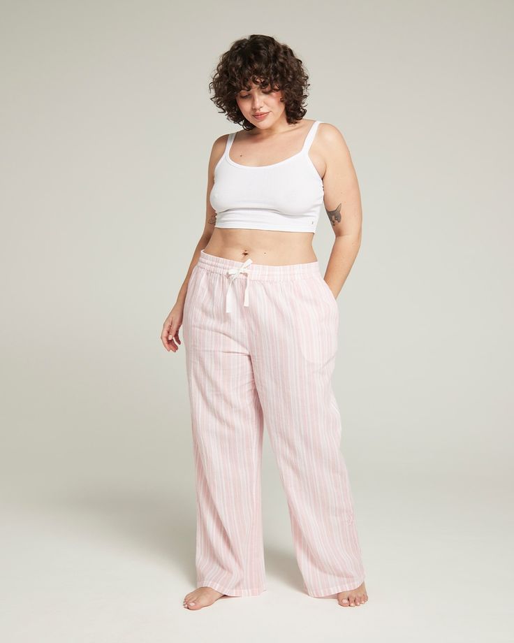 Relaxed-fit trousers in lightweight organic cotton that’s both cosy and cooling. Now available in two lengths Regular and Petite.  A classic pyjama trouser silhouette, adorned with signature Nudea detailing and a drawstring waist for maximum comfort and ultimate lounging possibilities. Pair with The Midi Shirt or The Tank to complete this dreamy look. 100% GOTS Certified Organic Cotton  Machine Washable at 30 deg Fondant Pink, Classic Pajamas, April Birthstone Jewelry, March Birthstone Jewelry, Classic Trousers, Nightwear Women, Artisan Gift, Gifts For New Mums, Blazer With Jeans