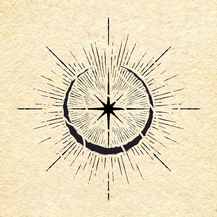 a drawing of a compass with rays coming out of it