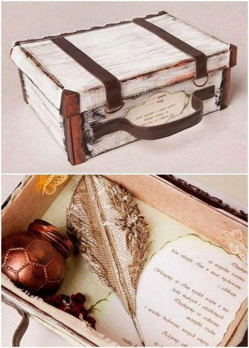 an open book with some writing on it and a box in the shape of a heart